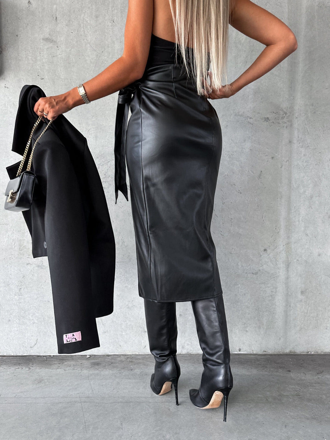 It's Not That Easy Tied High Waist Skirt Black Faux Leather Tied High Waist Skirt by Vim&Vigor | Vim&Vigor Boutique